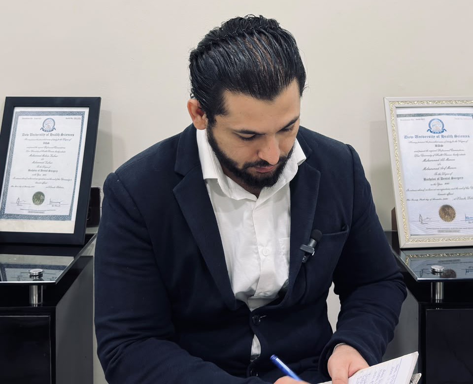 Dr. Mohsin Khan at MK Dental Aesthetics, flanked by his Bachelor of Dental Surgery credentials